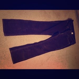 Brown pair of corduroy jeans made by London Jean